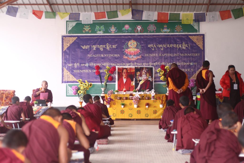 Monks of Dudjom Dundul Raptenling Monastery gathered in the assembly hall