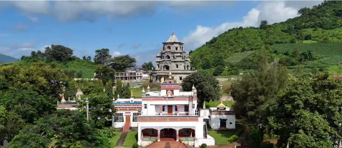 Aerial view of Dudjom Dundul Raptenling Monastery with the Zangdok Palri temple rising on the hillside behind
